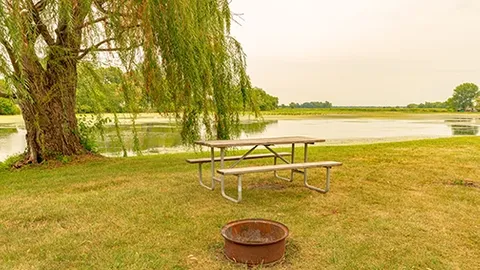 Deluxe Waterfront Water & Electric 30amp RV Site — image 2 of 5