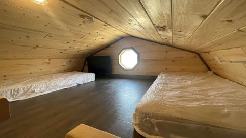 Deluxe Cabin w/ Loft & Pond View — image 2 of 9