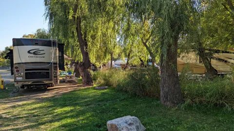 Back-In Leisure Creekside Wide RV Site — image 1 of 7