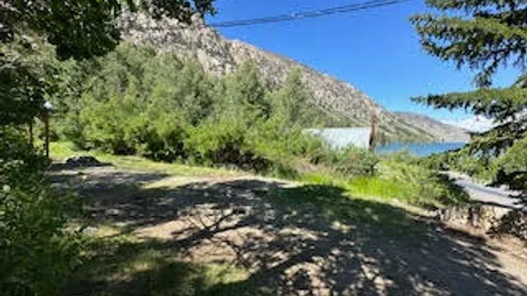 Hut C (water, electric) — PREMIUM partial hookup campsite close to lake — image 2 of 5