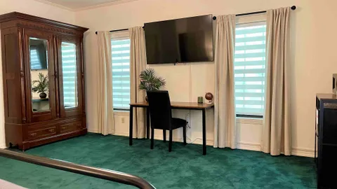 King Bed • Private Bath • Game Room & Hot Tub Access — image 2 of 7
