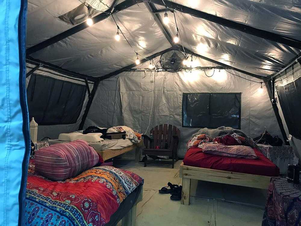 Glamping Package - Furnished 16' Square Tent (up to 8 people)
