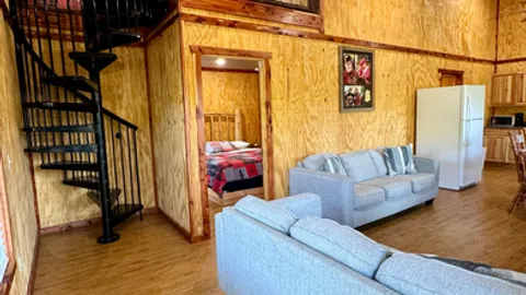 Creek Front Deluxe Cabin — image 1 of 12