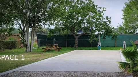 Back-In Full Hookup RV Site with Concrete Pad — image 1 of 10