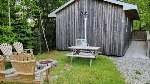6 "The Wolf" Deluxe cabin Double/Single/Accessible - sleeps 4 — image 1 of 5