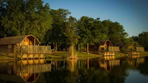 Lakeside Cabin with Patio Over Water — image 1 of 15