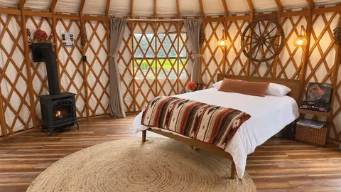 Yurt Y4 – ADA Accessible Wagonwheel Yurt | Queen Bed | Sleeps 2 — image 1 of 20