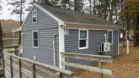 Premiere Waterfront Cabin 1 bedroom Loft — image 1 of 7