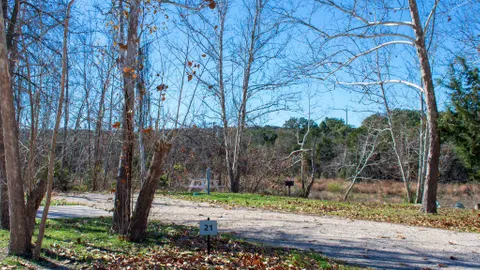 Short Term Premium Pond View Creekside Full Hookup Back-In RV — image 1 of 2