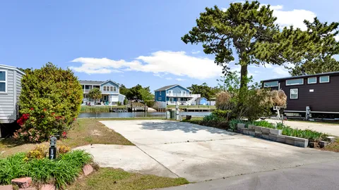 Deluxe Waterfront RV Site — image 1 of 43