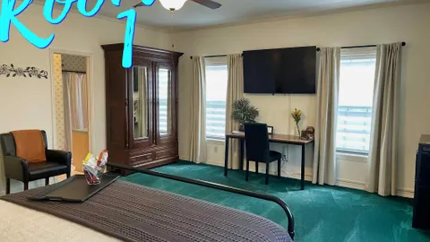 King Bed • Private Bath • Game Room & Hot Tub Access — image 1 of 7