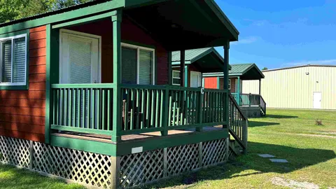 Deluxe Creekside Cabin — image 1 of 17