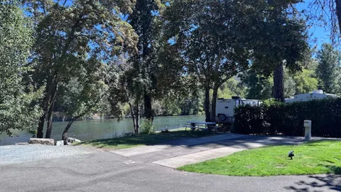 Riverfront Back-In 30/50 Amp RV Site — image 2 of 7