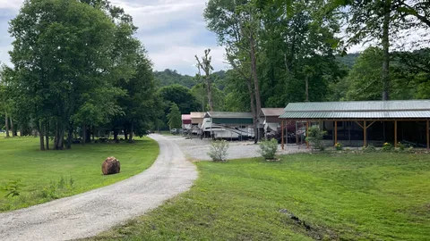 Premium 30/50 Amp Pondside RV Site — image 2 of 6