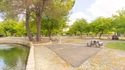 Waterfront Plus Full Hookup Back-In RV Site — image 1 of 4