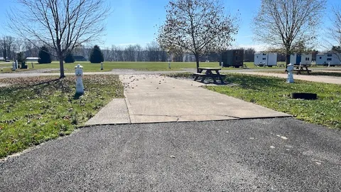 Full Hookup Pull-Through Concrete Pad RV Site — image 1 of 3