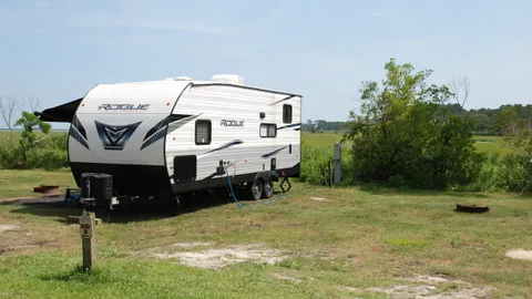 Standard Water and Electric Back-In RV Site — image 12 of 12