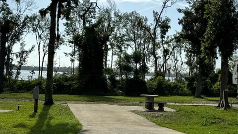 Deluxe - 30 AMP - Concrete Pull Through RV Site — image 1 of 1