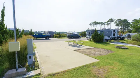 Waterfront Full Hookup Back-In RV Site with Dock — image 2 of 10