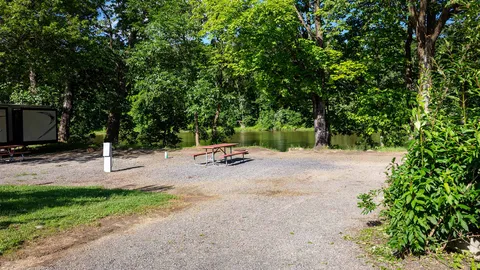 Riverfront Deluxe RV/Tent Site — image 1 of 6