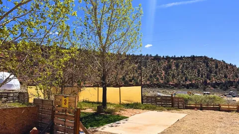Tent + Car Camping Site with Electric Hookups & Fenced Yard — image 1 of 12