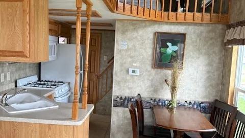 Lakeview Cabin: Sleeps 8 — Double Lofts & Covered Porch with Water Views — image 2 of 5