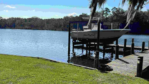 Captain's Quarters w/ Private Boat Slip & Lift — image 2 of 23