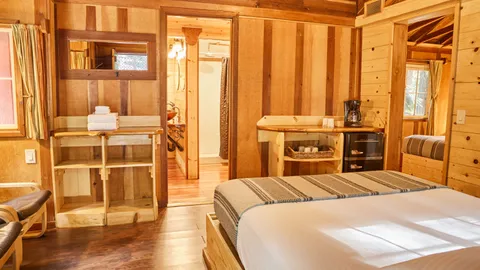 One Room Cabin with Two Queen Beds — image 1 of 9
