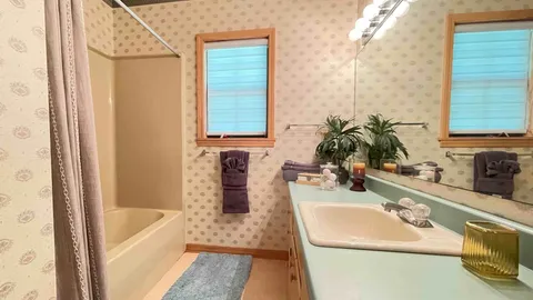 King Bed • Private Bath • Game Room & Hot Tub Access — image 7 of 7