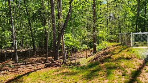 Campsite #8 RV/ Tent Site Full Hook Up 60’ x 18’ Level Gravel Pad with Fenced in Back Yard, Side Yard, Private path to trails, Back In — image 2 of 9
