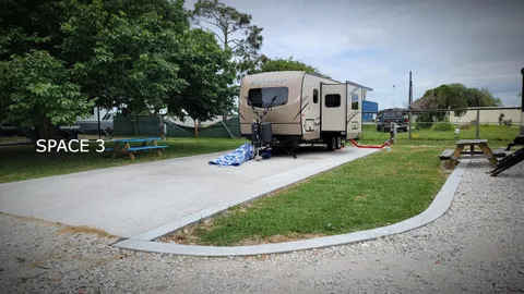Back-In Full Hookup RV Site with Concrete Pad — image 2 of 10