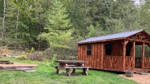 Rustic Cabin with Porch — image 2 of 4