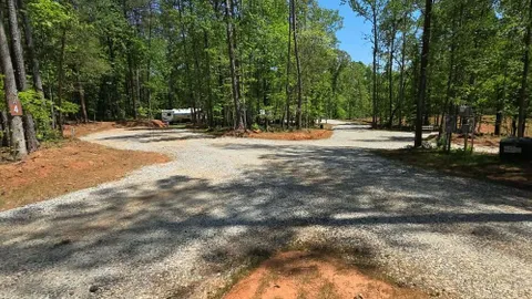 Campsite #4 RV /Tent Site Full Hook Up,  40’ x 18’  Level Gravel Pad with Back Yard and Shaded Fenced Enclosure for you Pets, Back In — image 13 of 13
