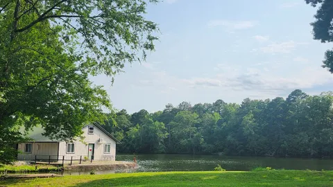 Cozy Lakefront Fishing Cabin with Loft — image 1 of 11
