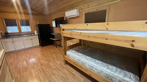 Premiere Waterfront Cabin 1 bedroom with sleeping porch — image 2 of 7