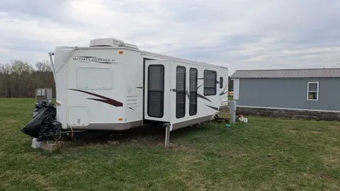 30/50 Amp Full Hook-Up Back-in RV Site — image 1 of 2