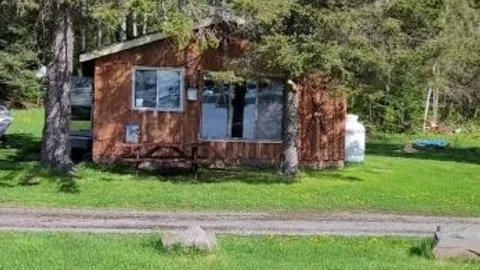 Cabin #4 - Deluxe 2 Bedroom Lakefront Cabin w/ 2 Doubles, 1 Single, and 1 Bunk — image 2 of 21