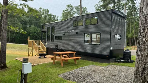 Deluxe RV on Pond ~Sleeps 7 ~Dog Park ~Playground — image 1 of 11
