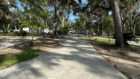 Premiere - 30/50 AMP -  Concrete with Patio Pull Through RV Site — image 1 of 2