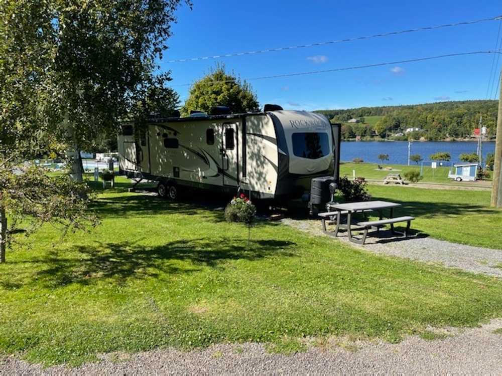 Full Service - 30 Amp, Water & Sewer Back-In RV Site - River/Sunset View