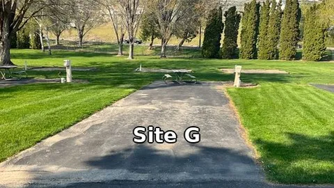 Deluxe-RV w/Tent Pad Site — image 2 of 24