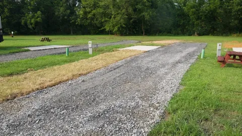 50ft Max RV - 30/50 Amp Pull Through Full Hookup River Side RV Site W/Concrete Pad (PF) — image 1 of 1