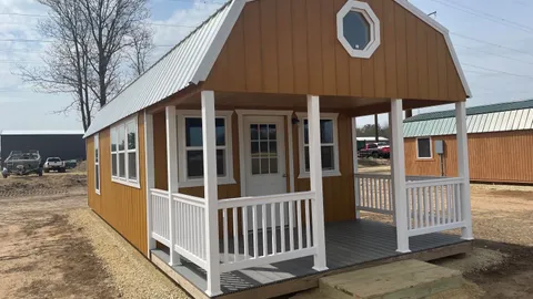 Deluxe Cabin w/ Loft & Pond View — image 1 of 9