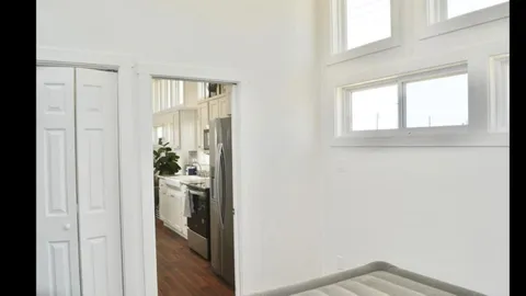 79 - White Tiny Home — image 2 of 7