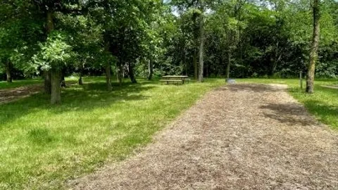 Premium Back In Full Hookup RV Site with Stone Pad — image 1 of 21