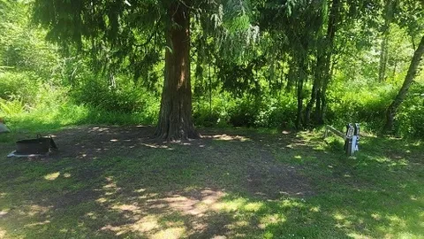 Creekside-Tent with Water/Power — image 1 of 4