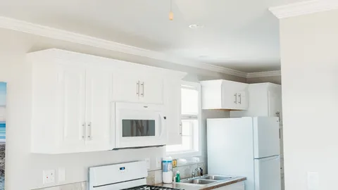 Beachside Waterfront Deluxe Cottage — image 2 of 8