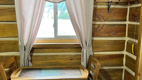 Standard Cabin - Sleeps 4 — image 1 of 3
