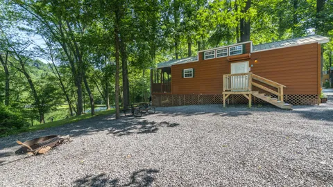 Ranger Smith™ Waterfront Deluxe Cabin — image 1 of 5