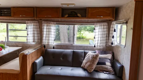 "THE OLIVE BRANCH" - {Large Camper Rental with Attached Porch} — image 2 of 22